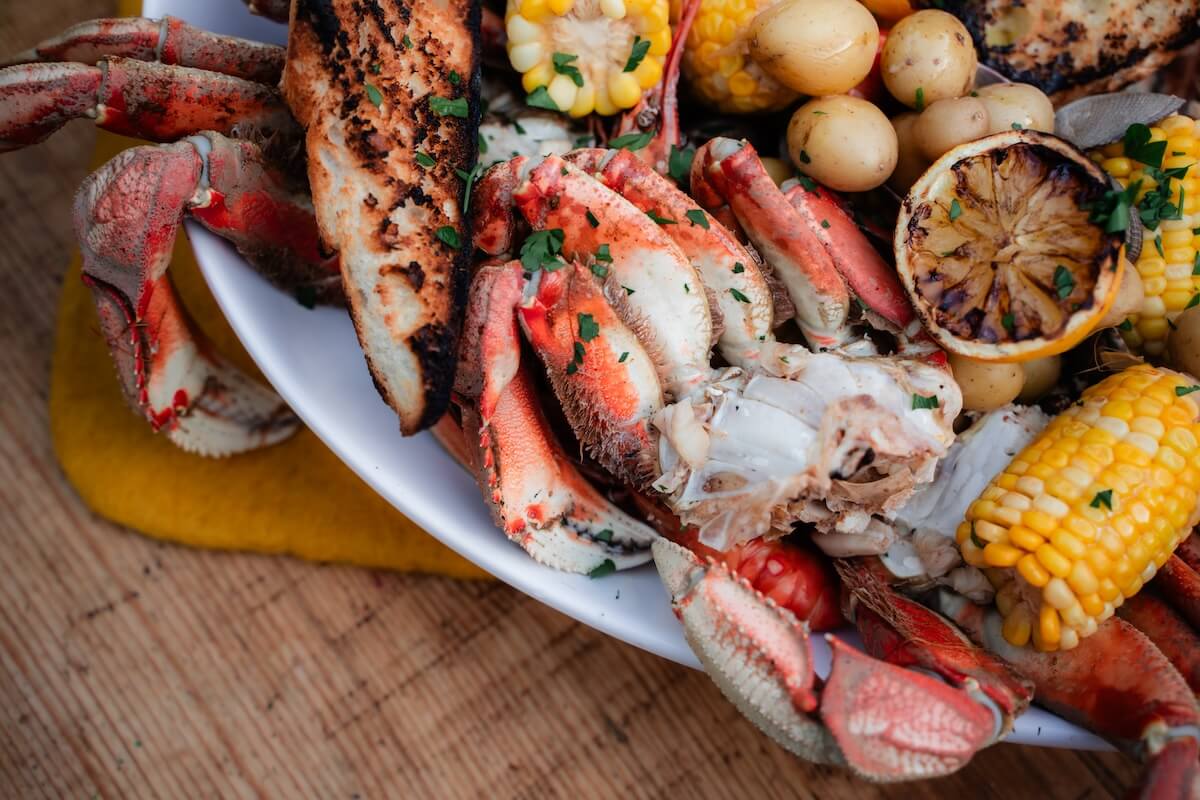 BC Crab Boil Bucket with corn, bread, and butter at BC CrabFest